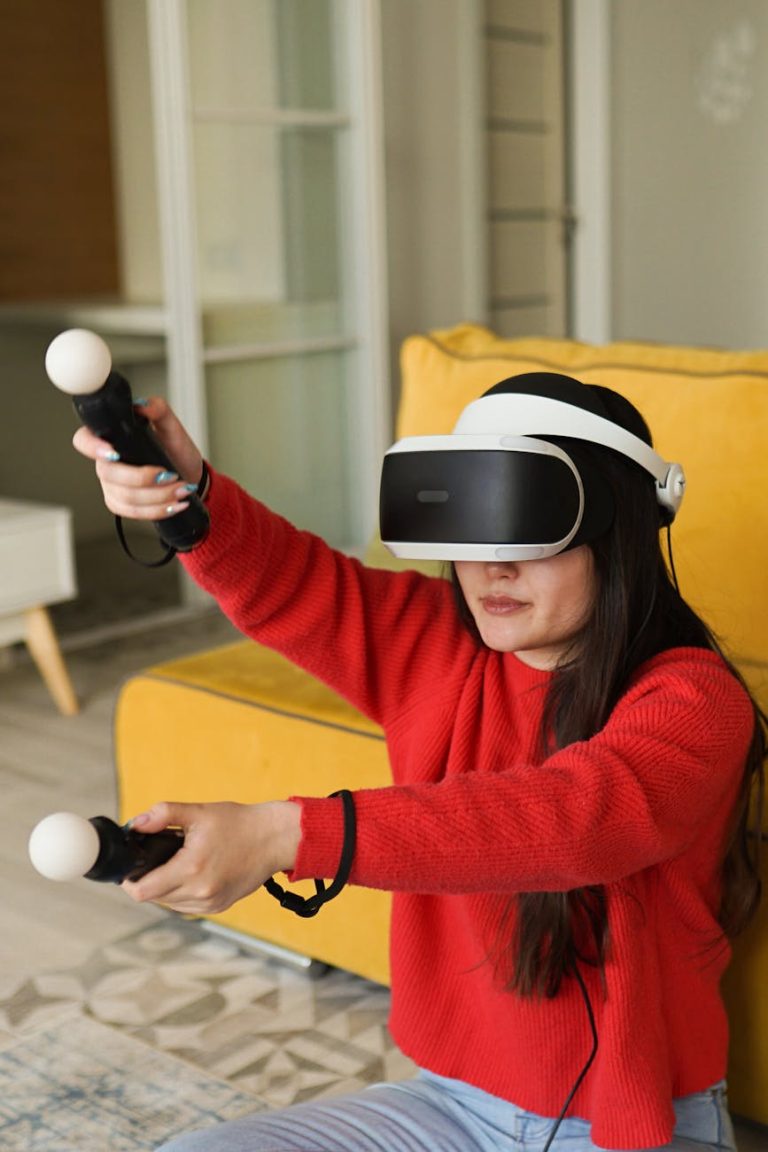 A woman enjoying virtual reality gaming with controllers in a cozy indoor setting.